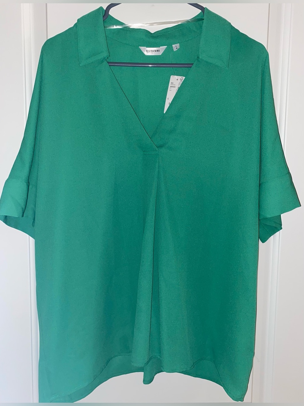 Reitmans Signature short sleeve blouse in green- Size L